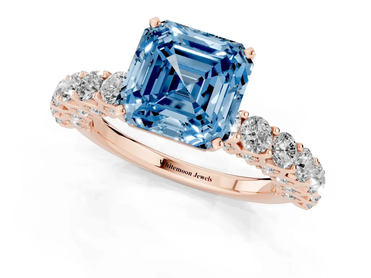 Fancy Blue Asscher Cut Diamond Solitaire Ring with Shared Prong Pavé Band and Four-Prong Setting Rose gold