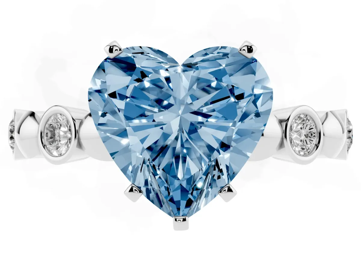 Fancy Blue Heart Cut Solitaire Bezel-Set Diamond Ring with Beaded Band and Four-Prong Setting Silver