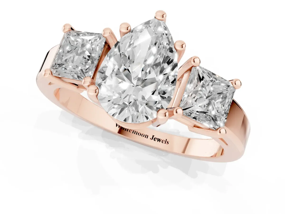 Three-Stone Pear Cut Cut Solitaire Ring with Prong Setting Rose gold