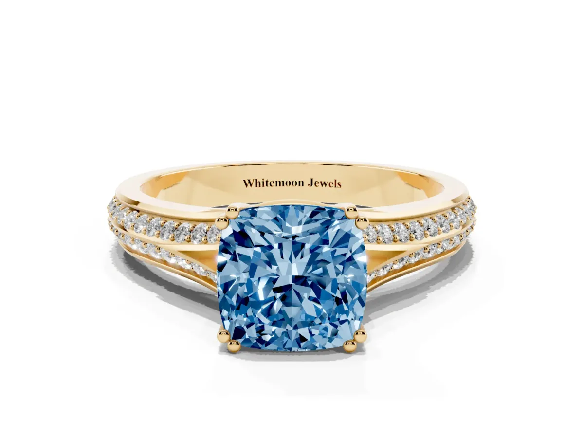 Fancy Blue Cushion Cut Diamond Split Shank Engagement Ring with Pavé Band Yellow gold