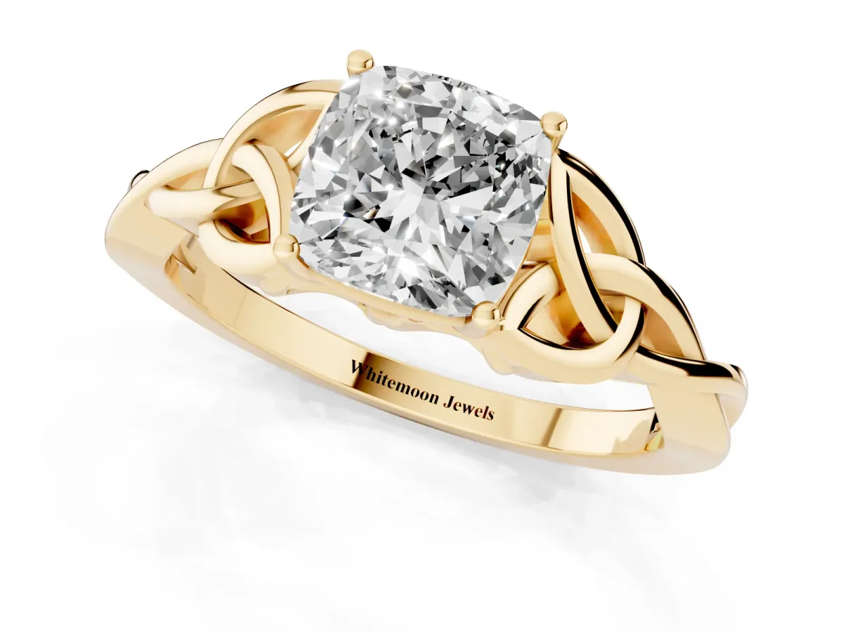 Cushion Cut Diamond Solitaire Engagement Ring with Celtic Knot Band and Four-Prong Setting Yellow gold