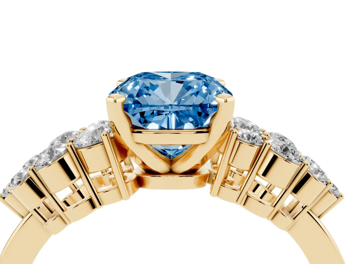 Fancy Blue Cushion Cut Cluster Diamond Engagement Ring with Pavé Band and Four-Prong Setting Yellow gold