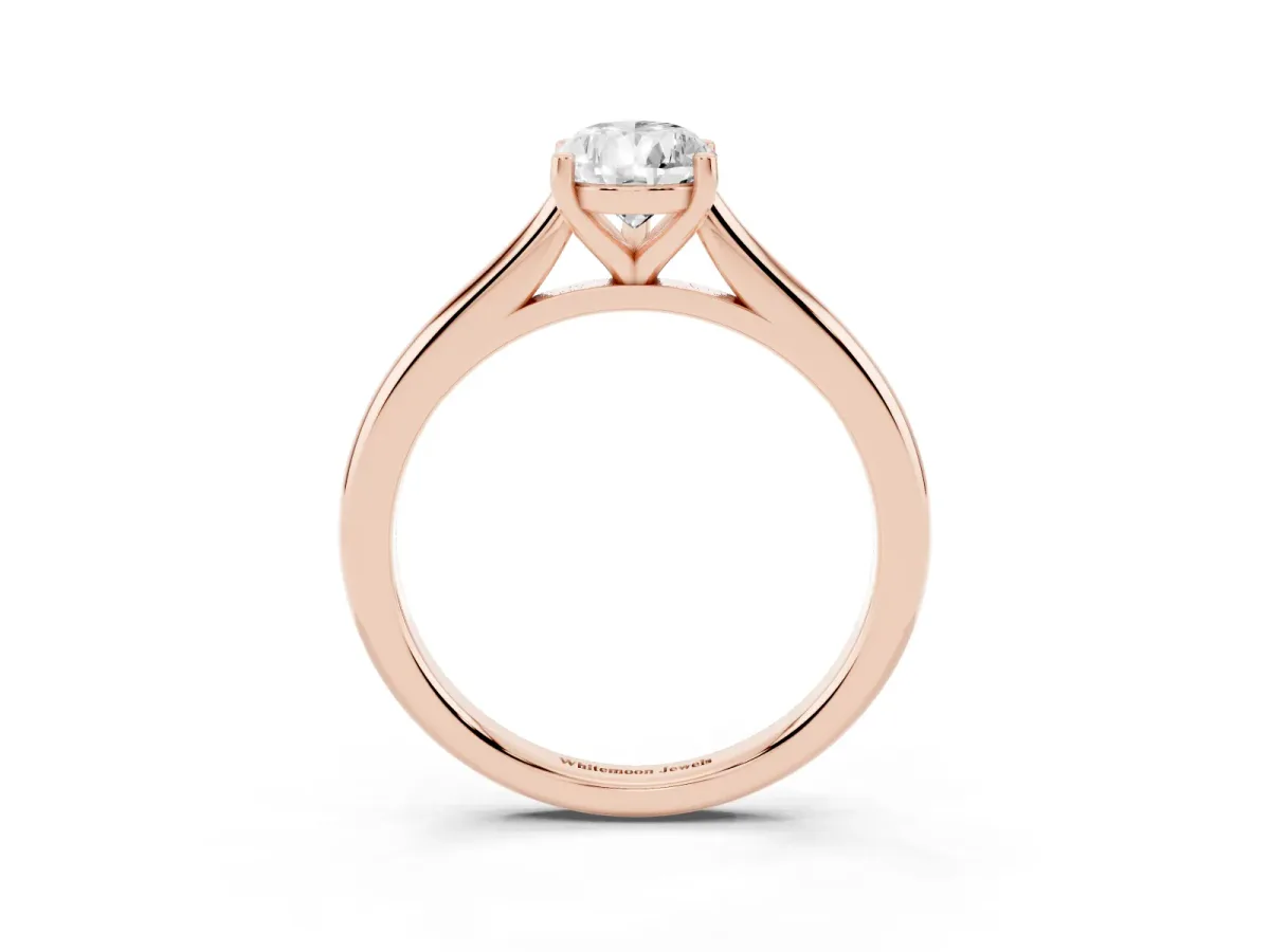 Pear Cut Cut Solitaire Ring with Cathedral Band and Four-Prong Setting Rose gold