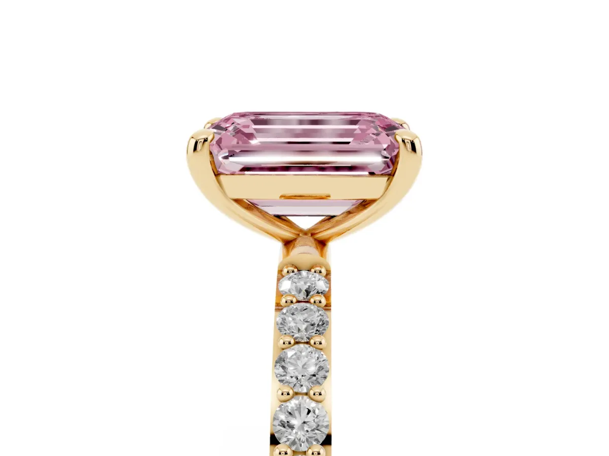 Fancy Pink Emerald Cut Diamond Solitaire Ring with Round Pavé Band and Prong Setting Yellow gold