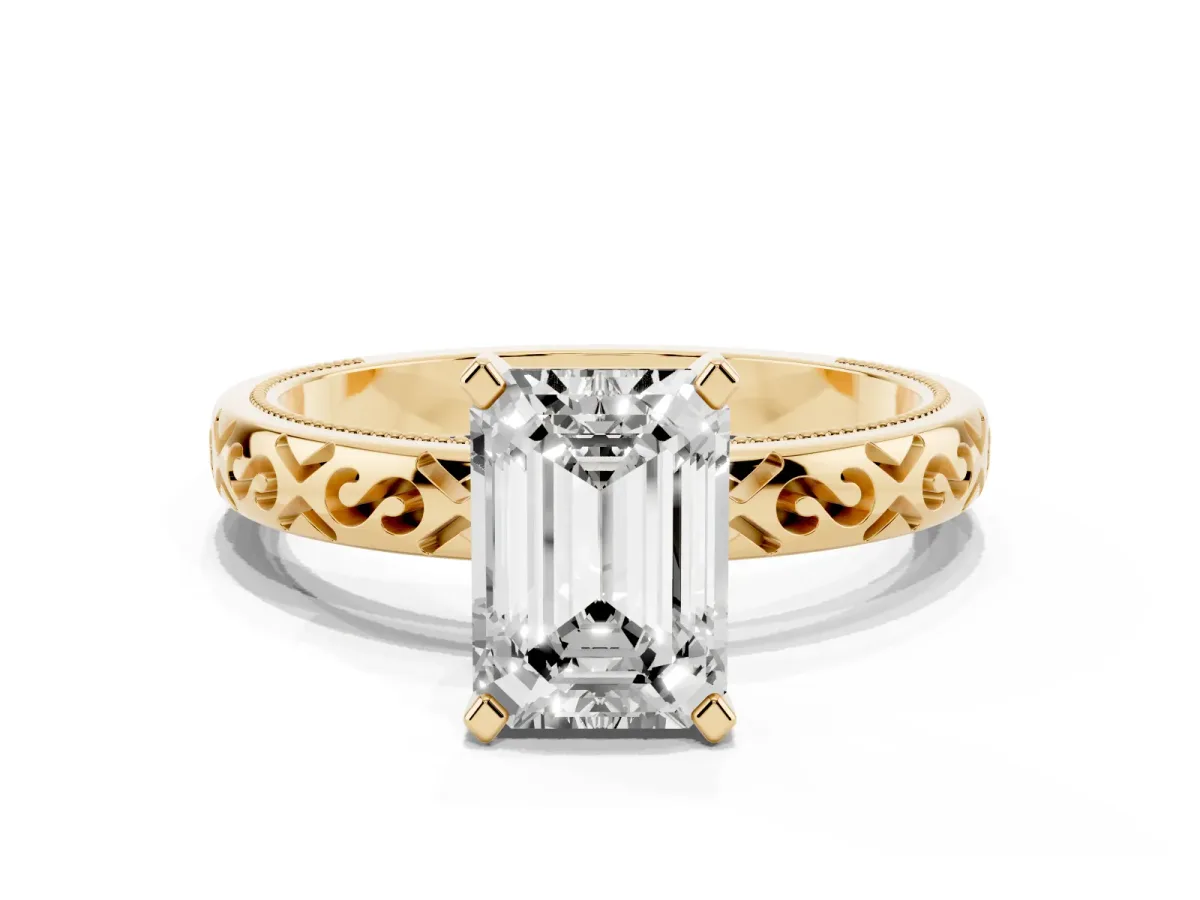 Emerald Cut Solitaire Engagement Ring with Scrollwork Band and Four-Prong Setting Yellow gold