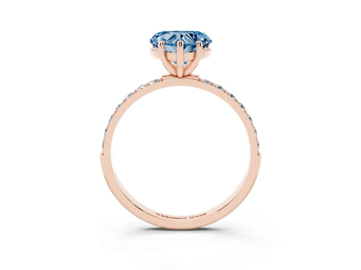 Fancy Blue Heart Cut Diamond Solitaire Ring with Round Pavé Shoulders and Prong Setting Rose gold