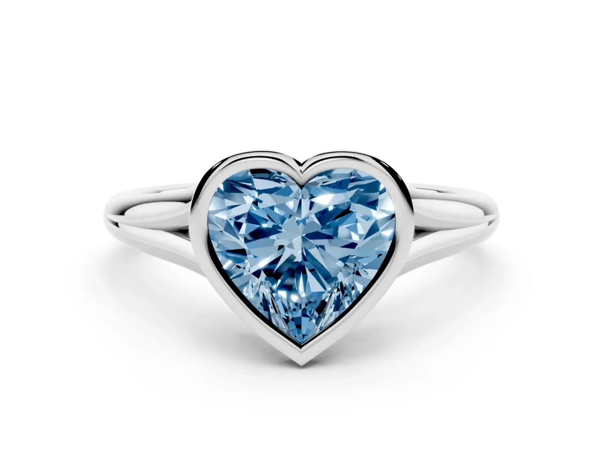 Fancy Blue Bezel Set Heart Cut Cut Solitaire Ring with Tapered Band White gold