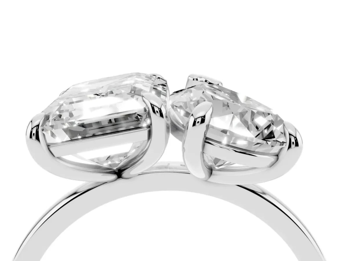 Pear and Emerald Toi Moi Ring with Prong Setting and Plain Band Silver