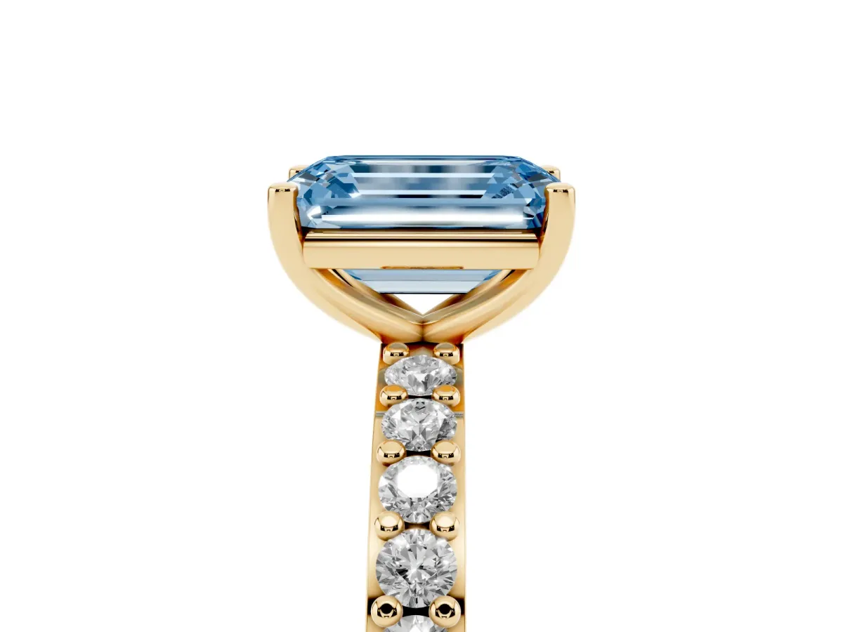 Fancy Blue Emerald Cut Cut Diamond Solitaire with Pave Band and Four-Prong Setting Yellow gold