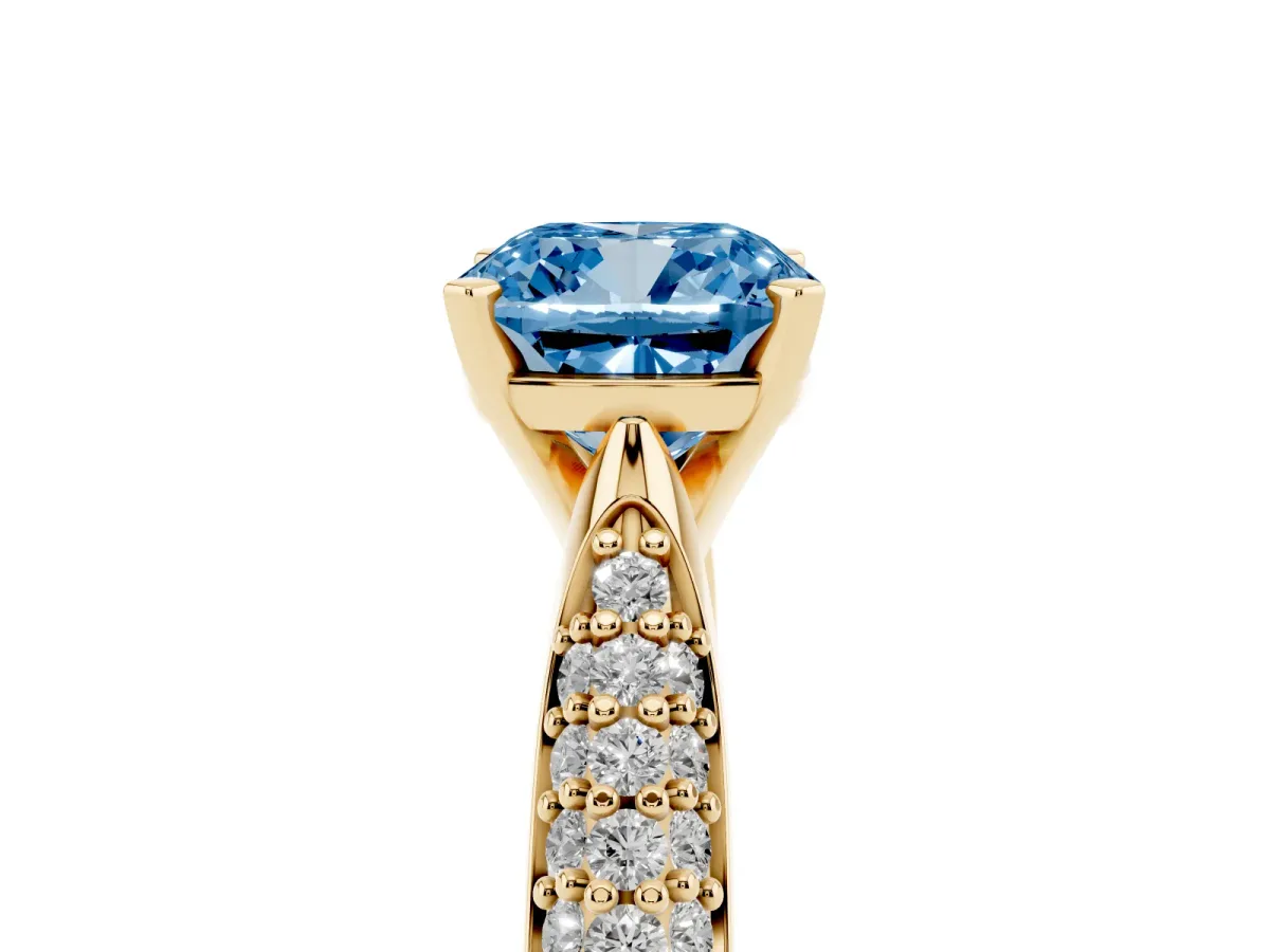 Fancy Blue Cushion Cut Diamond Solitaire Engagement Ring with Multi-Row Round Pavé Band and Prong Setting Yellow gold