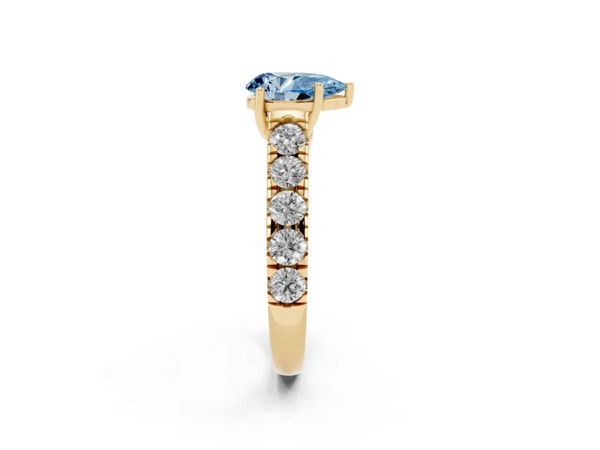 Fancy Blue Pear Cut Cut Diamond Solitaire Ring with Micro Pave Band and Prong Setting Yellow gold