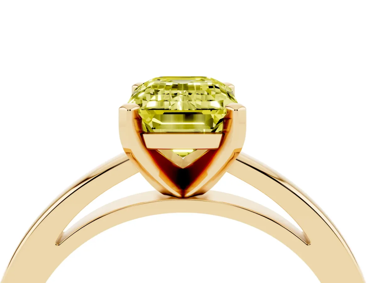 Fancy Yellow Emerald Cut Solitaire Diamond Engagement Ring with Four-Prong Setting on a Classic Band Yellow gold