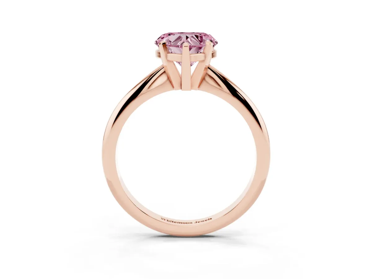Fancy Pink Heart Cut Cut Solitaire Ring with Four-Prong Setting on a Classic Band Rose gold