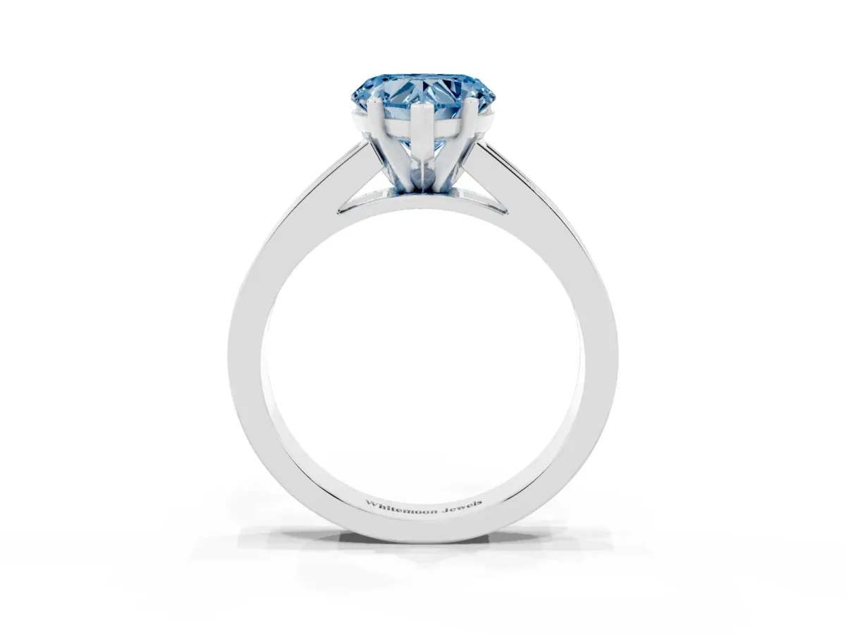 Fancy Blue Heart Cut Solitaire Diamond Ring with Channel-Set Band and Four-Prong Setting Silver