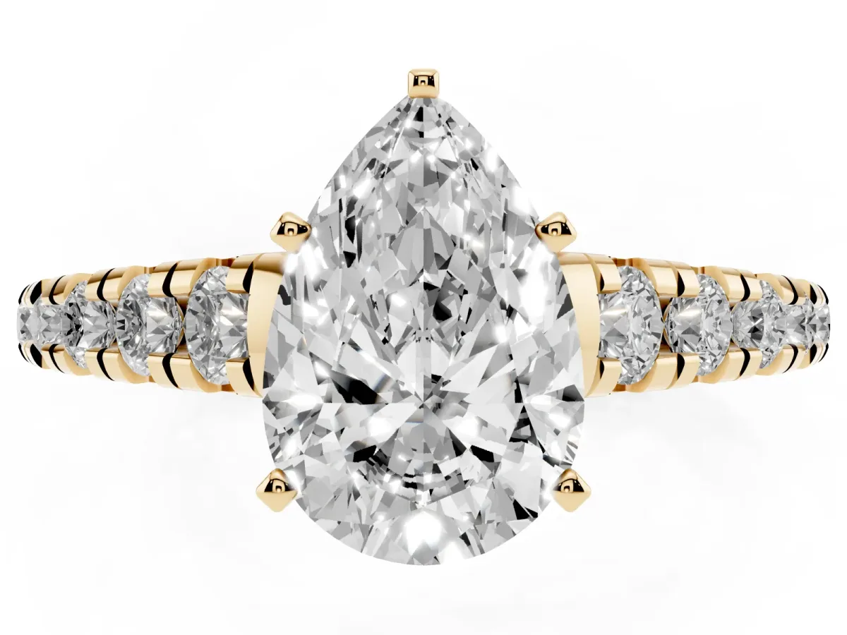 Pear Cut Diamond Cathedral Solitaire Ring with Round Pavé Band Yellow gold