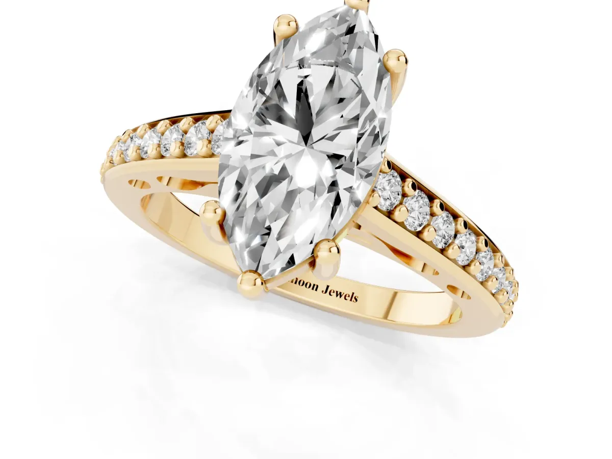 Marquise Cut Solitaire Prong Set Diamond Engagement Ring with Pave Band Yellow gold