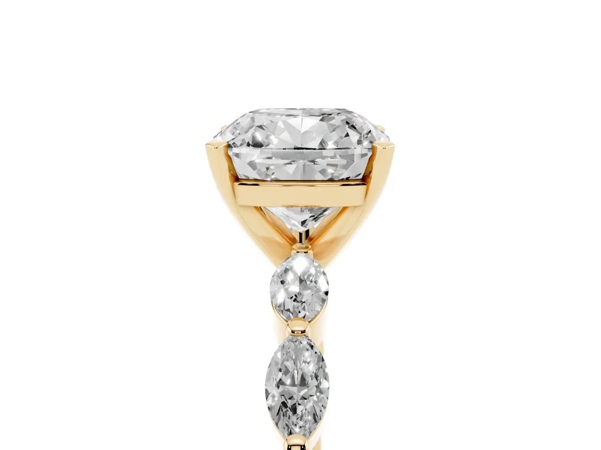 Cushion Cut Diamond Ring with Marquise Side Stones and Prong Setting Yellow gold