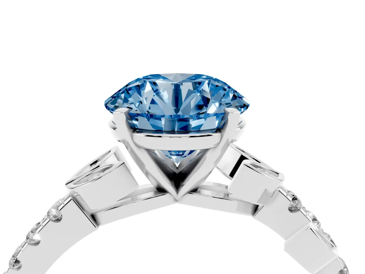 Fancy Blue Round Cut Solitaire Leaf-Inspired Diamond Ring with Pavé Band and Four-Prong Setting Silver