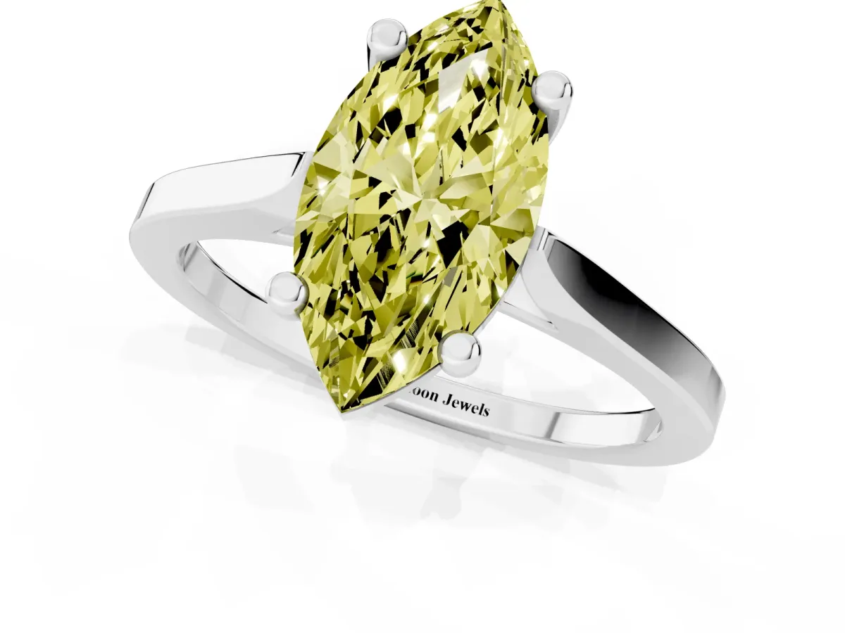 Fancy Yellow Marquise Cut Solitaire Diamond Ring with Four-Prong Setting and Tapered Band White gold