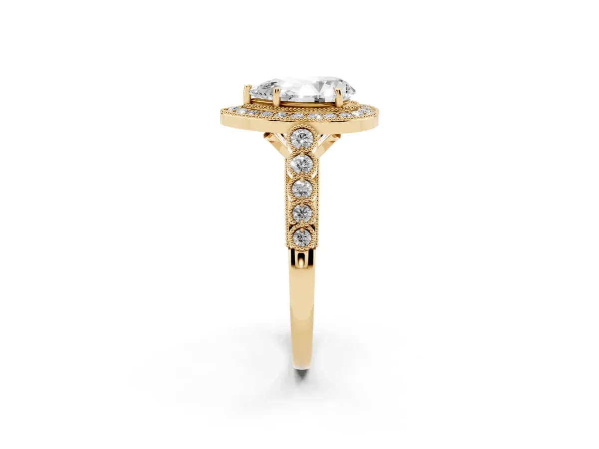 Pear Cut Halo Milgrain Solitaire with Bezel Set Side Stones and Pave Band Yellow gold