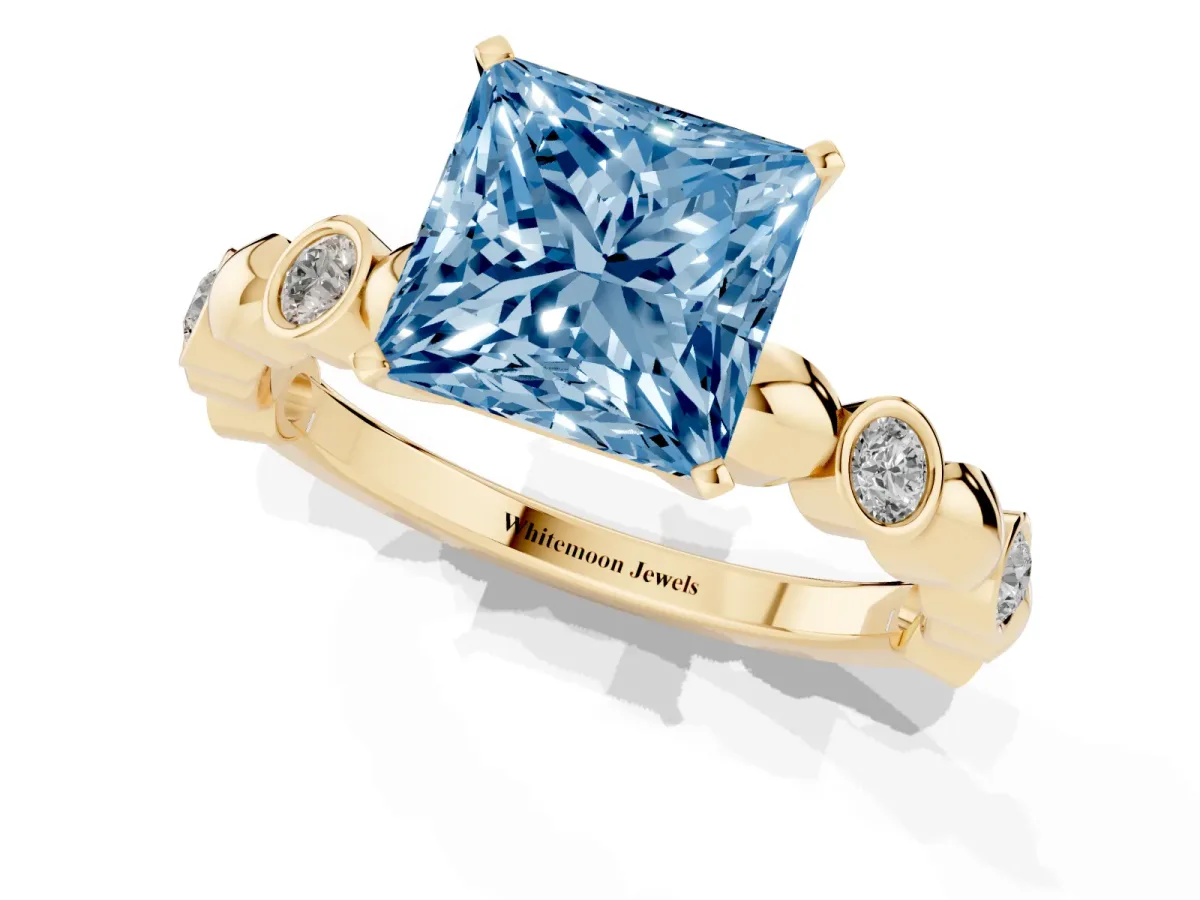 Fancy Blue Princess Cut Solitaire Bezel-Set Diamond Ring with Beaded Band and Four-Prong Setting Yellow gold