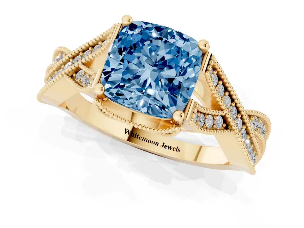 Fancy Blue Cushion Cut Cut Diamond Twisted Band with Milgrain Pave Setting and Four-Prong Setting Yellow gold