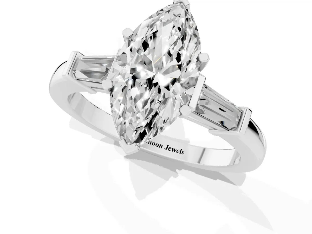 Marquise Cut Cut Diamond Solitaire Ring with Tapered Baguette Accents and Four-Prong Setting Platinum