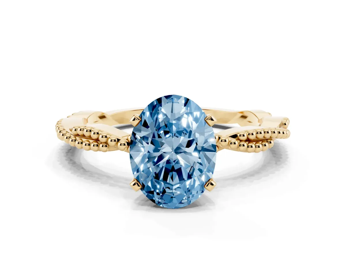 Fancy Blue Oval Cut Solitaire Twisted Band with Bead Prong Setting Yellow gold