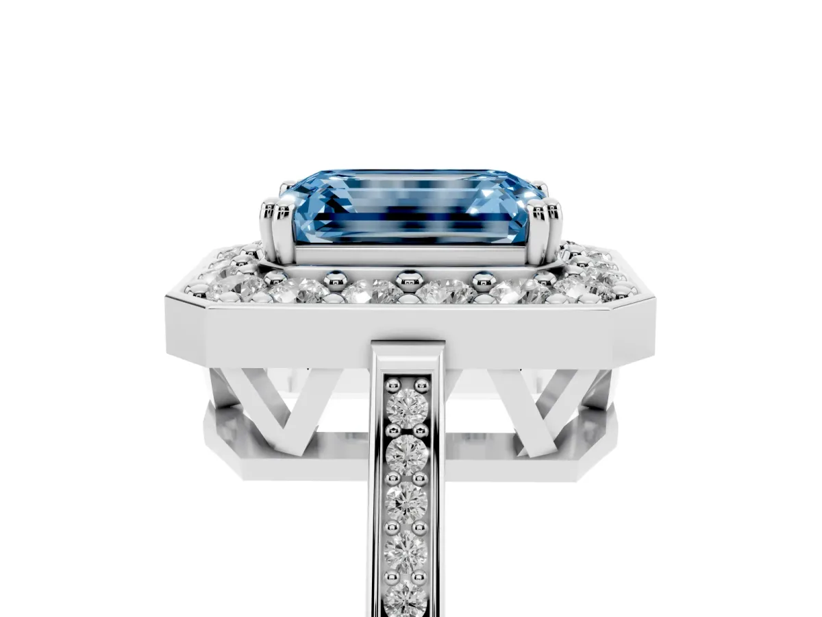 Fancy Blue Emerald Cut Diamond Halo Ring with Split Shank and Four-Prong Setting Silver