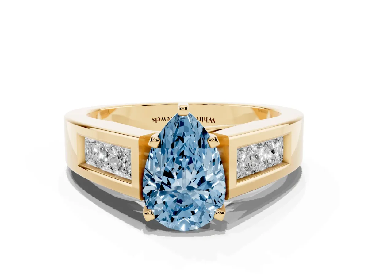 Fancy Blue Pear Cut Cut Channel Set Solitaire Ring with Four-Prong Setting Yellow gold