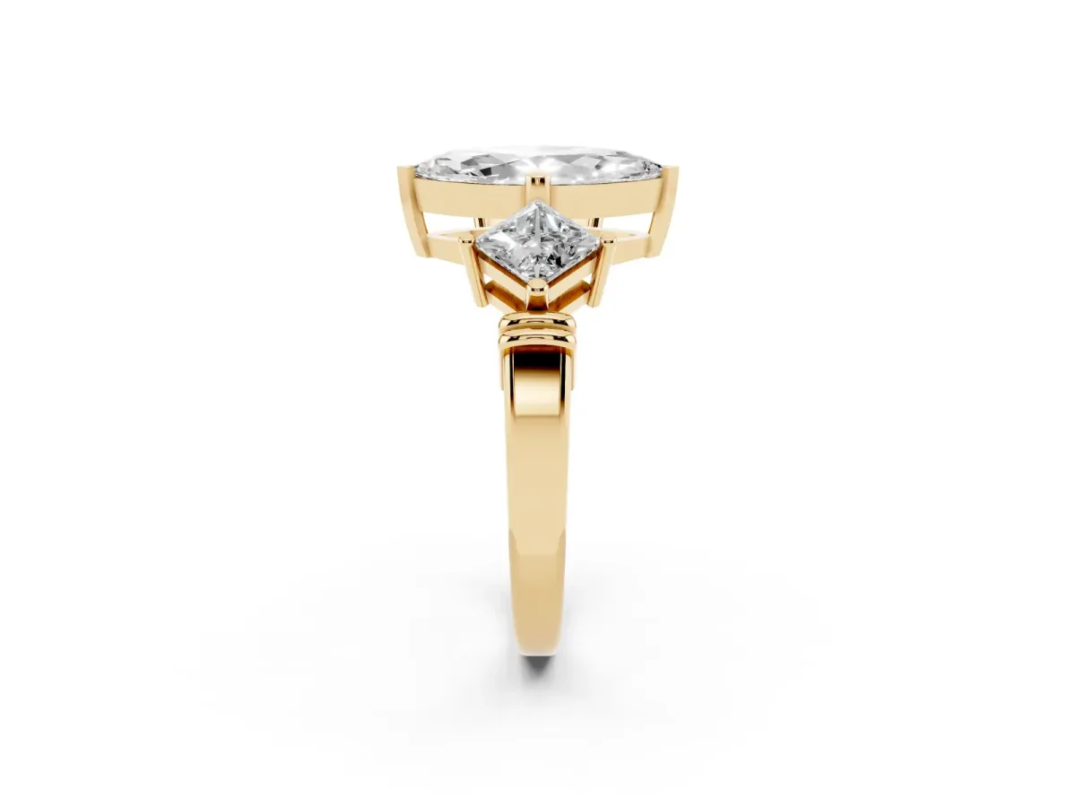 Three-Stone Marquise Cut and Princess Cut Diamond Ring with Channel Band and Four-Prong Setting Yellow gold
