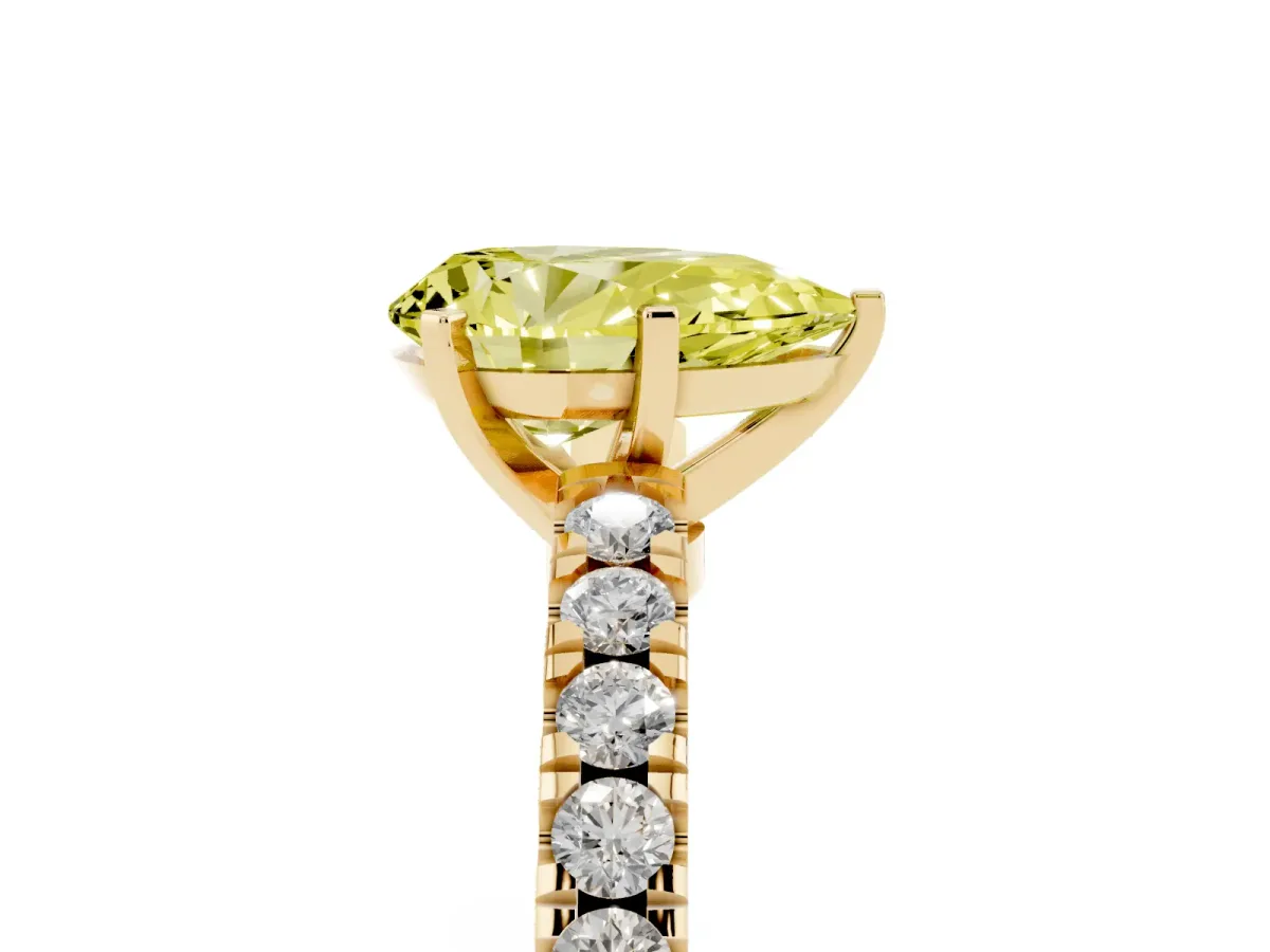 Fancy Yellow Pear Cut Solitaire Diamond with Pavé Band and Four-Prong Setting Yellow gold