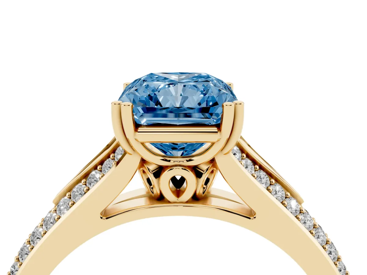 Fancy Blue Radiant Cut Diamond Split Shank Engagement Ring with Pavé Band Yellow gold