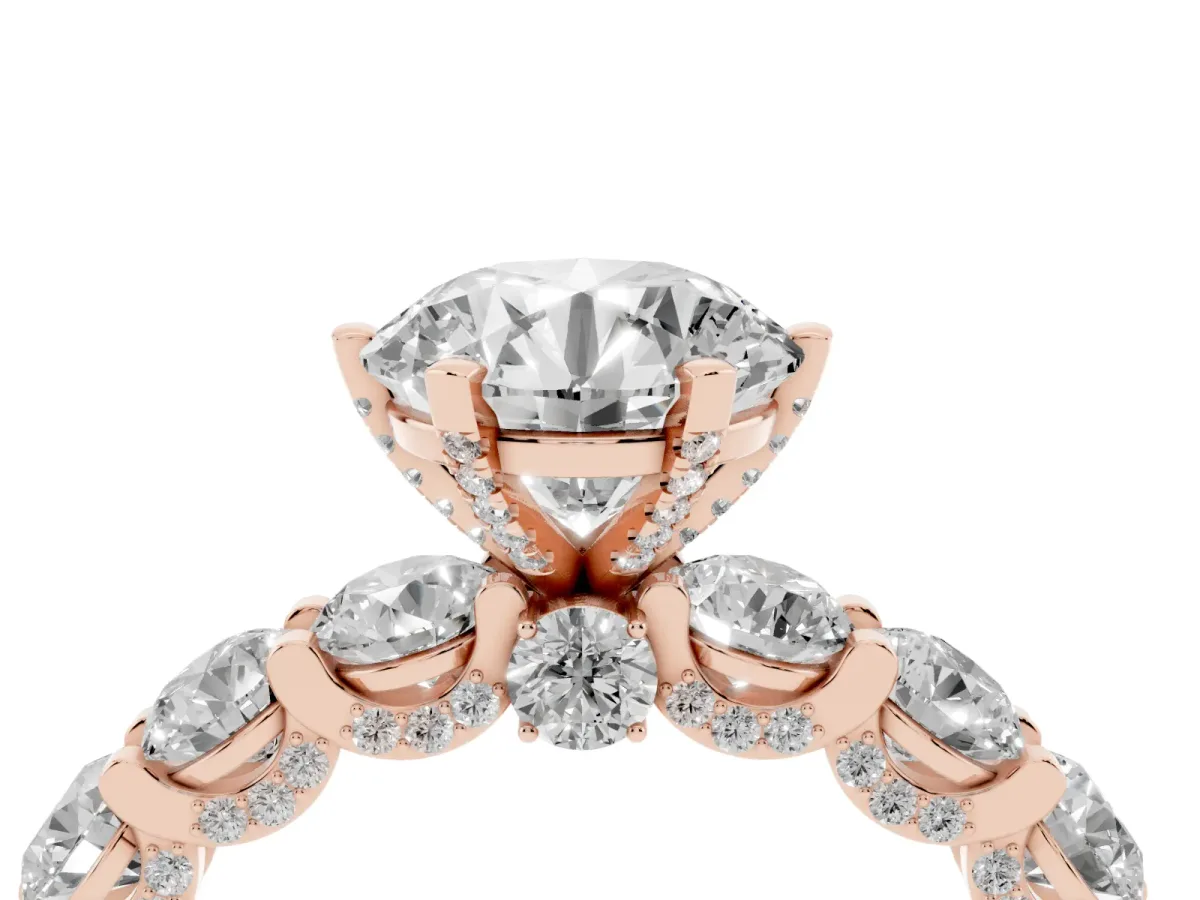 Round Cut Diamond Side Stone Engagement Ring with Four-Prong Setting Rose gold
