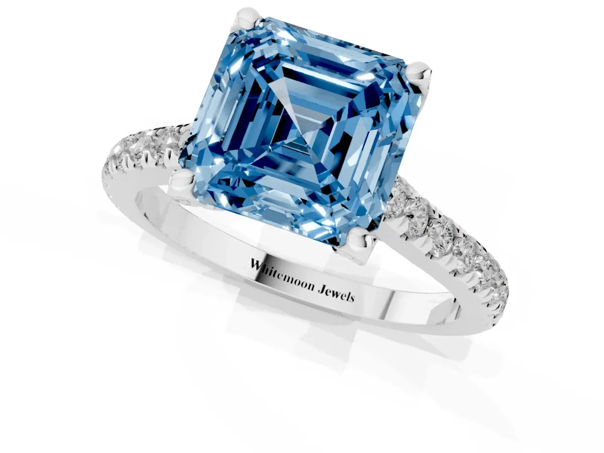 Fancy Blue Asscher Cut Brilliant Diamond Solitaire with Pavé Band and Four-Prong Setting Silver