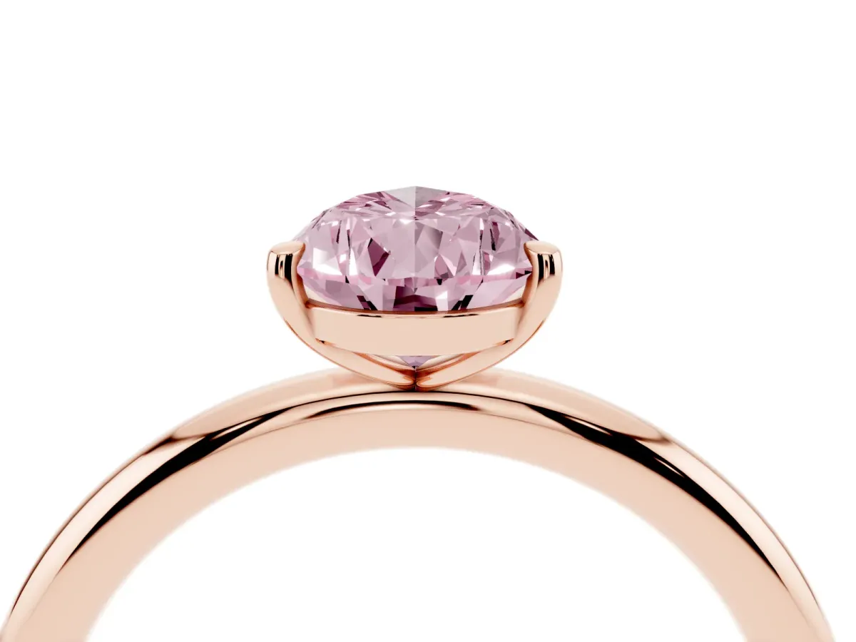 Fancy Pink Pear Cut Solitaire Diamond Ring with Four-Prong Setting on a Plain Band Rose gold