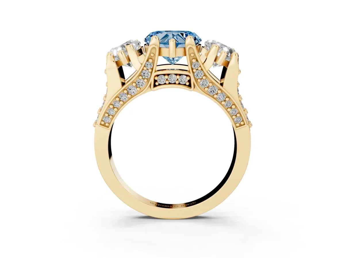 Fancy Blue Heart Cut Diamond Three-Stone Ring with Channel Set Band and Four-Prong Setting Yellow gold
