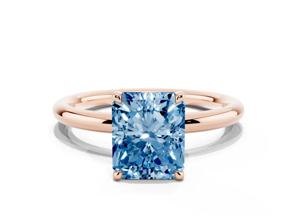 Fancy Blue Radiant Cut Diamond Solitaire Ring with Thin Band and Four-Prong Setting Rose gold