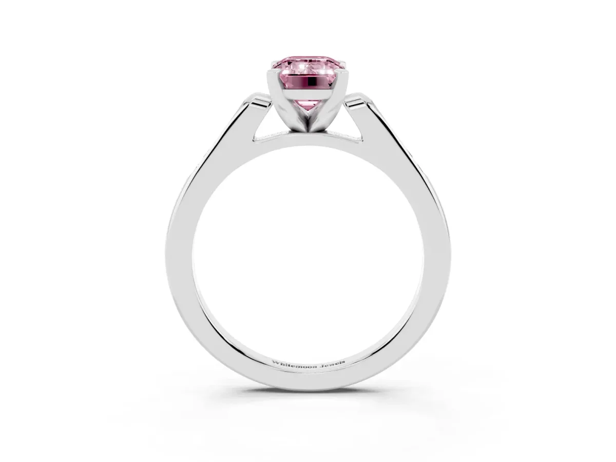 Fancy Pink Emerald Cut Diamond Solitaire Ring with Channel Set Round Band and Prong Setting White gold