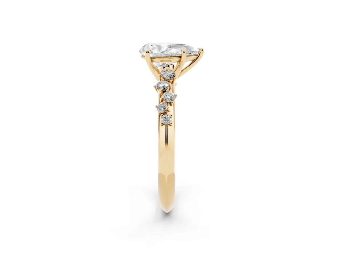 Pear Cut Diamond Cluster Side Stone Solitaire Ring with Prong Setting Yellow gold