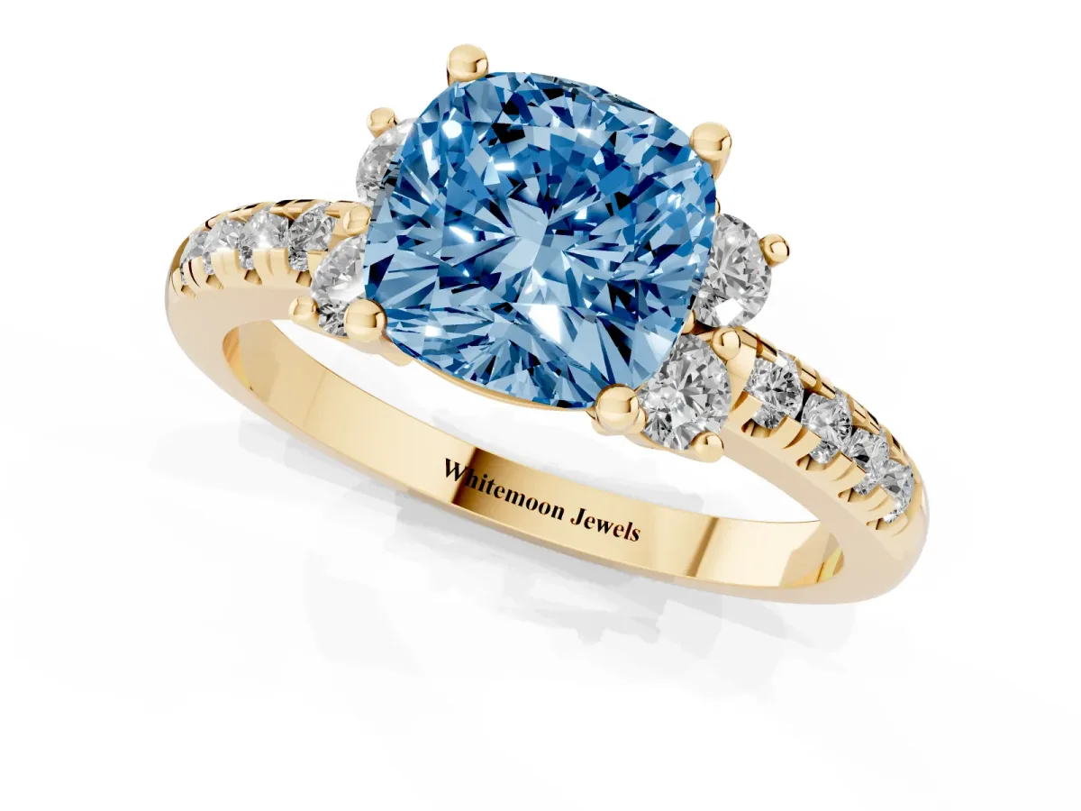 Fancy Blue Cushion Cut Diamond Three-Stone Pave Band with Four-Prong Setting Yellow gold
