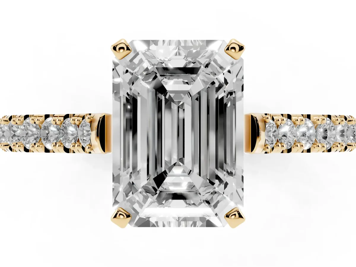 Emerald Cut Cut Solitaire Diamond Engagement Ring with Pave Band and Four-Prong Setting Yellow gold