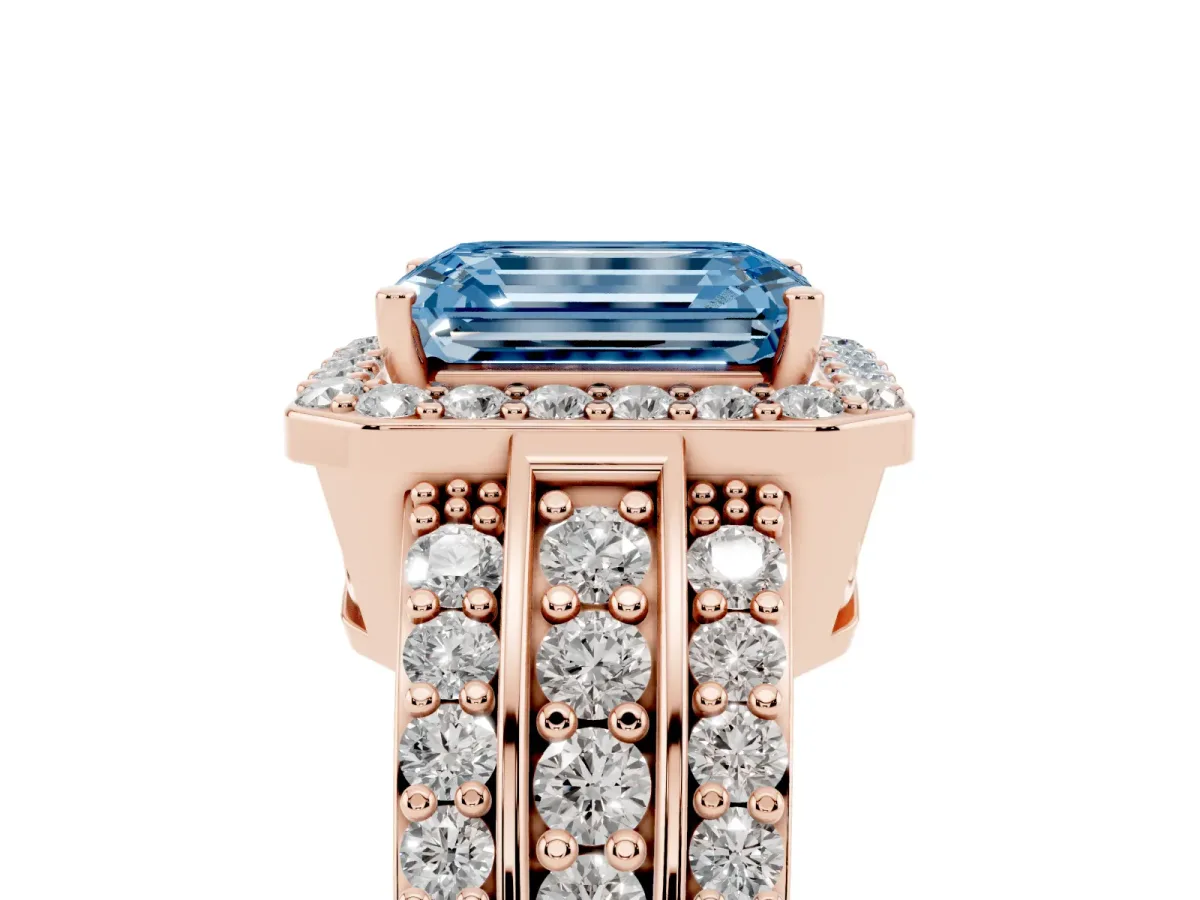 Fancy Blue Emerald Cut Halo Diamond Ring with Round Split Shank and Prong Setting Rose gold