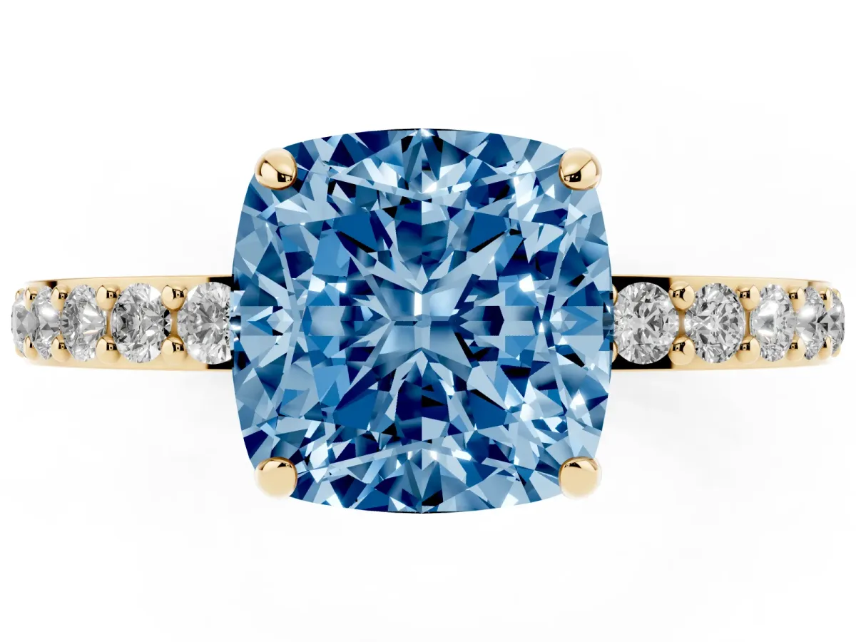 Fancy Blue Cushion Cut Diamond Pavé Engagement Ring with Round Accents and Prong Setting Yellow gold