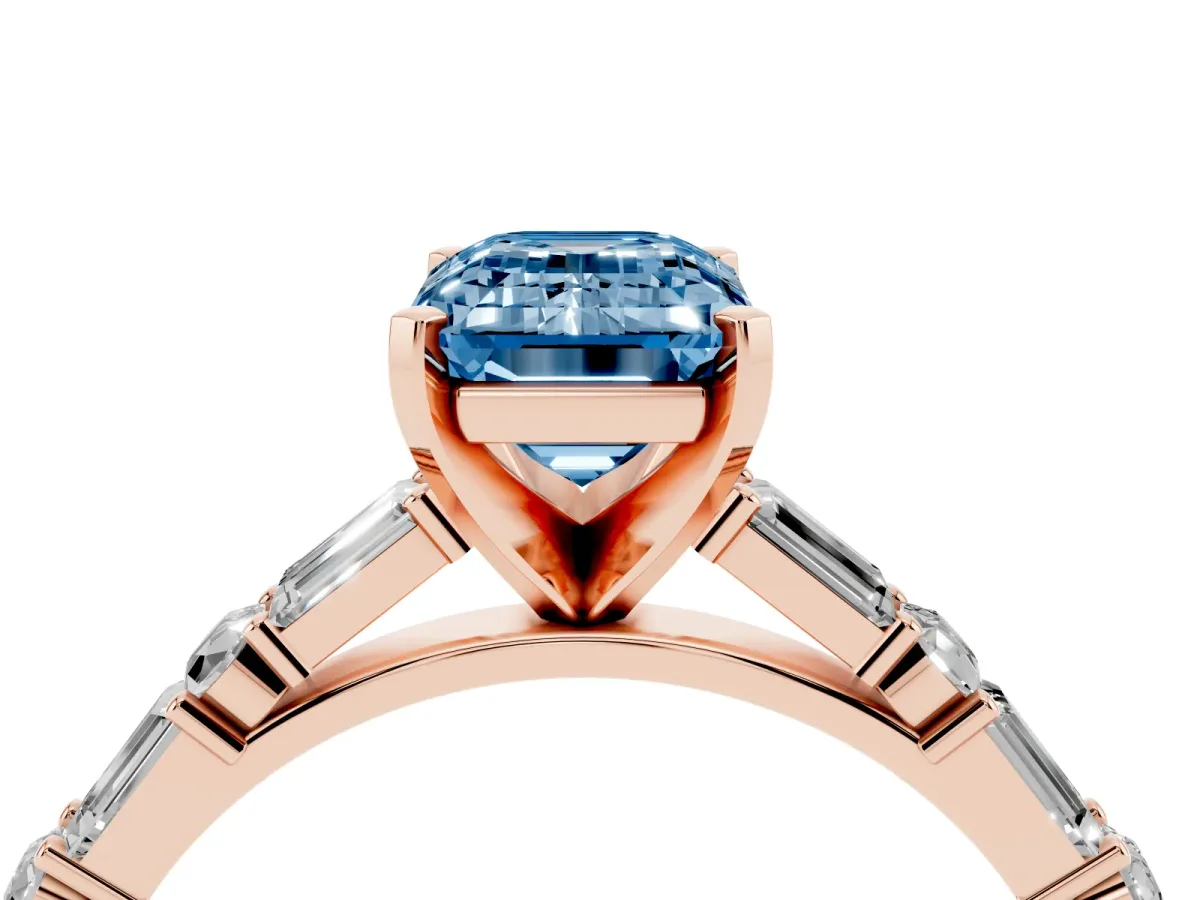 Fancy Blue Emerald Cut Diamond Solitaire with Side Baguettes and Channel Set Band Rose gold