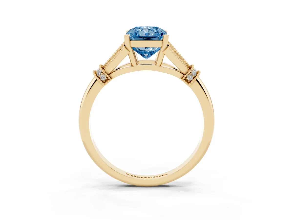 Fancy Blue Radiant Cut Diamond Solitaire Ring with Floral Filigree and Pave Accents Yellow gold