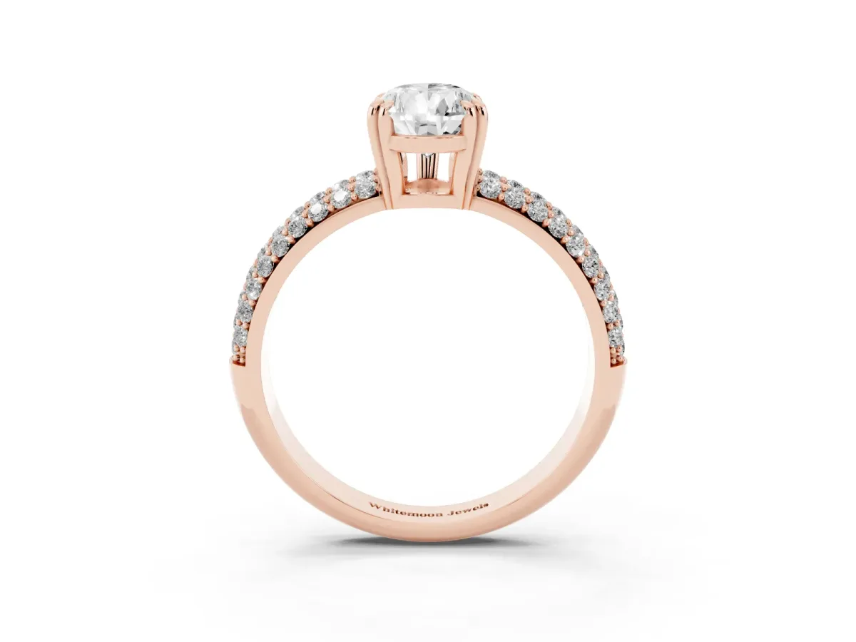 Pear Cut Diamond Solitaire Ring with Multi-Row Round Pavé Band and Prong Setting Rose gold