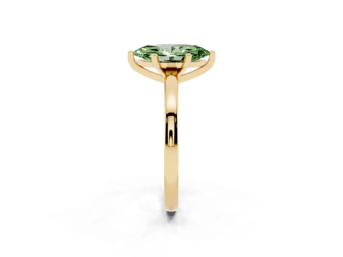 Fancy Green Marquise Cut Solitaire Diamond Engagement Ring with Four-Prong Setting on a Classic Band Yellow gold