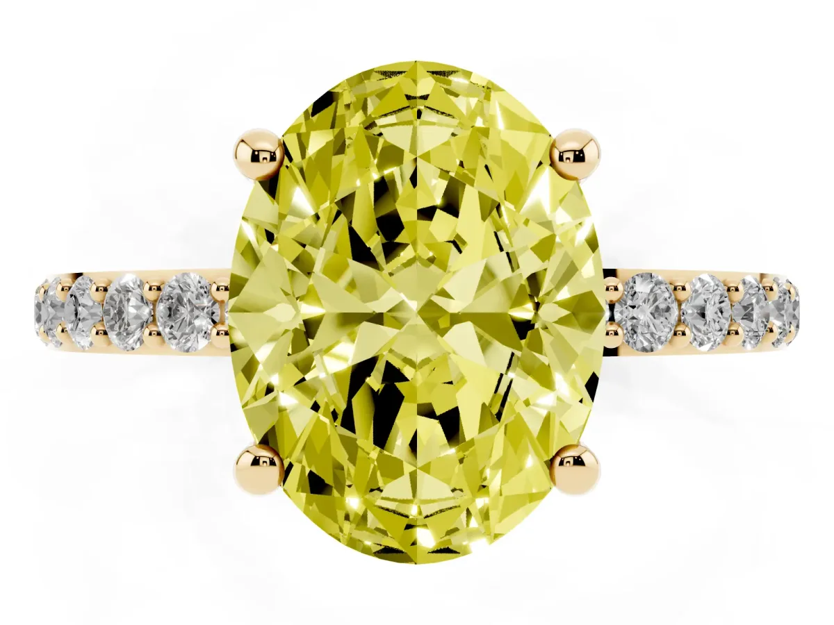 Fancy Yellow Oval Cut Diamond Solitaire Ring with Round Pavé Band and Prong Setting Yellow gold