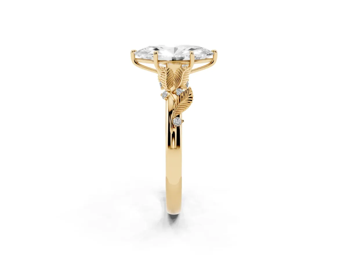 Marquise Cut Diamond Solitaire Ring with Leaf Motif Band and Four-Prong Setting Yellow gold